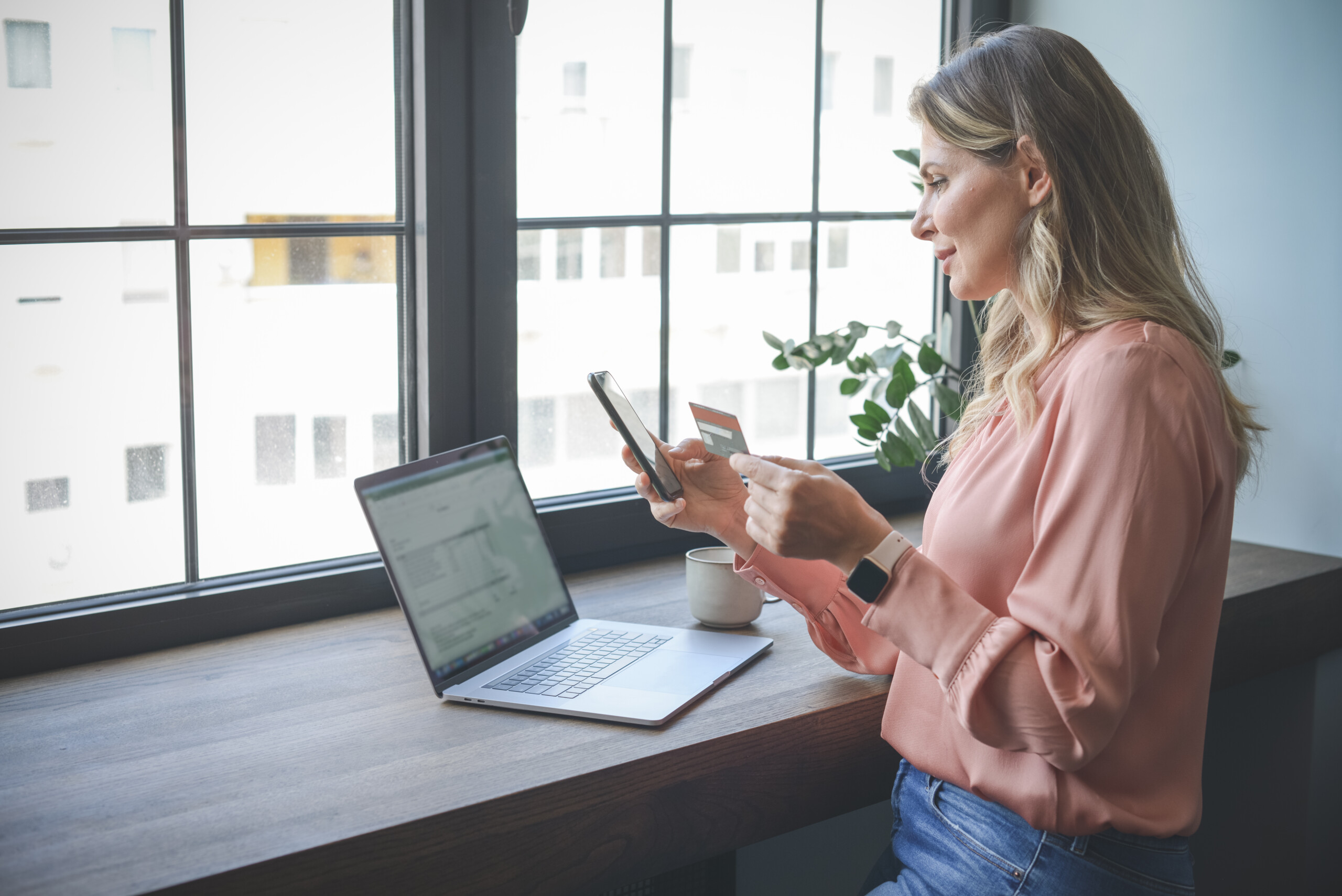 attractive middle aged woman working in the office